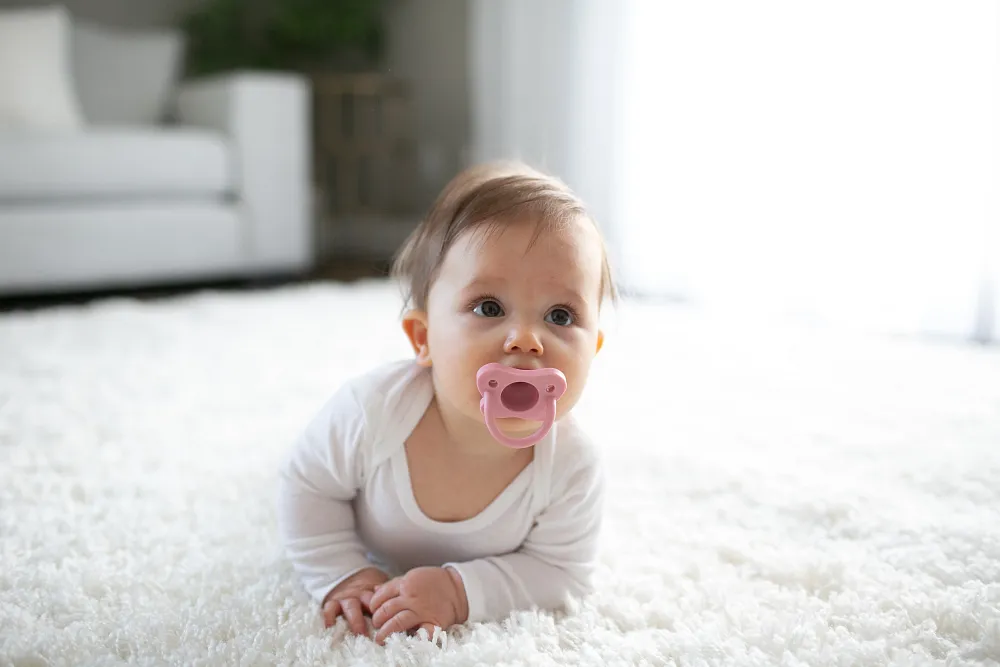 Lifestyle_HappyPaci_Silicone_Pacifier_Pink_3